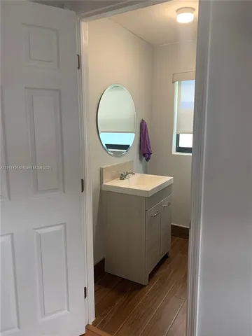 a utility room with a sink dryer and washer