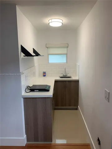 a utility room with washer and dryer