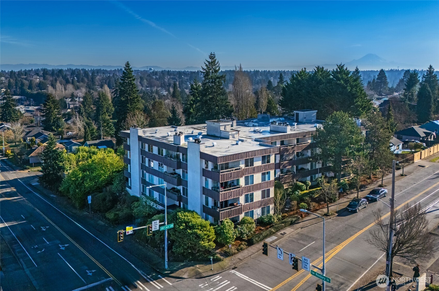 3421 Southwest Roxbury Street, Unit 401 Seattle, WA 98126 - Photo 1 of 22 a view of a patio in a backyard