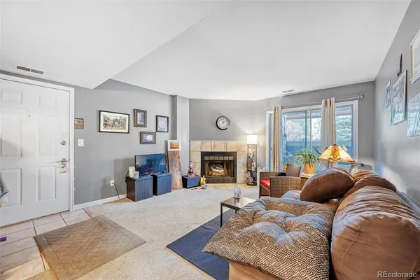 a bed room with a bed and a fireplace