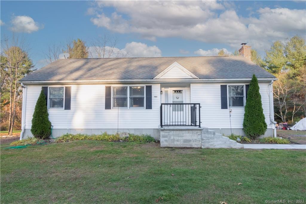 front view of house with a yard