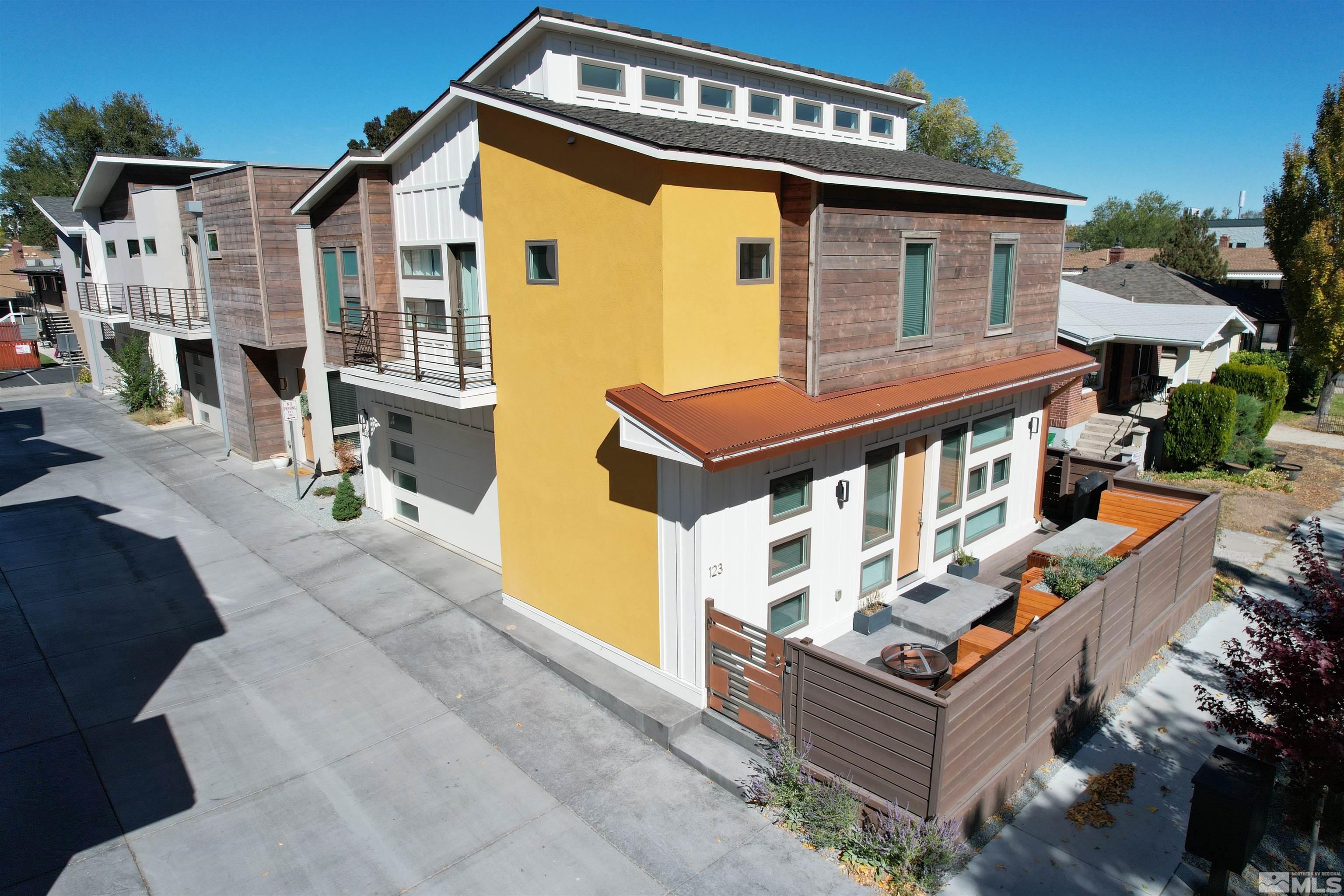 123 Martin Street Reno, NV 89509 - Photo 1 of 31 a view of a house with pool and chairs