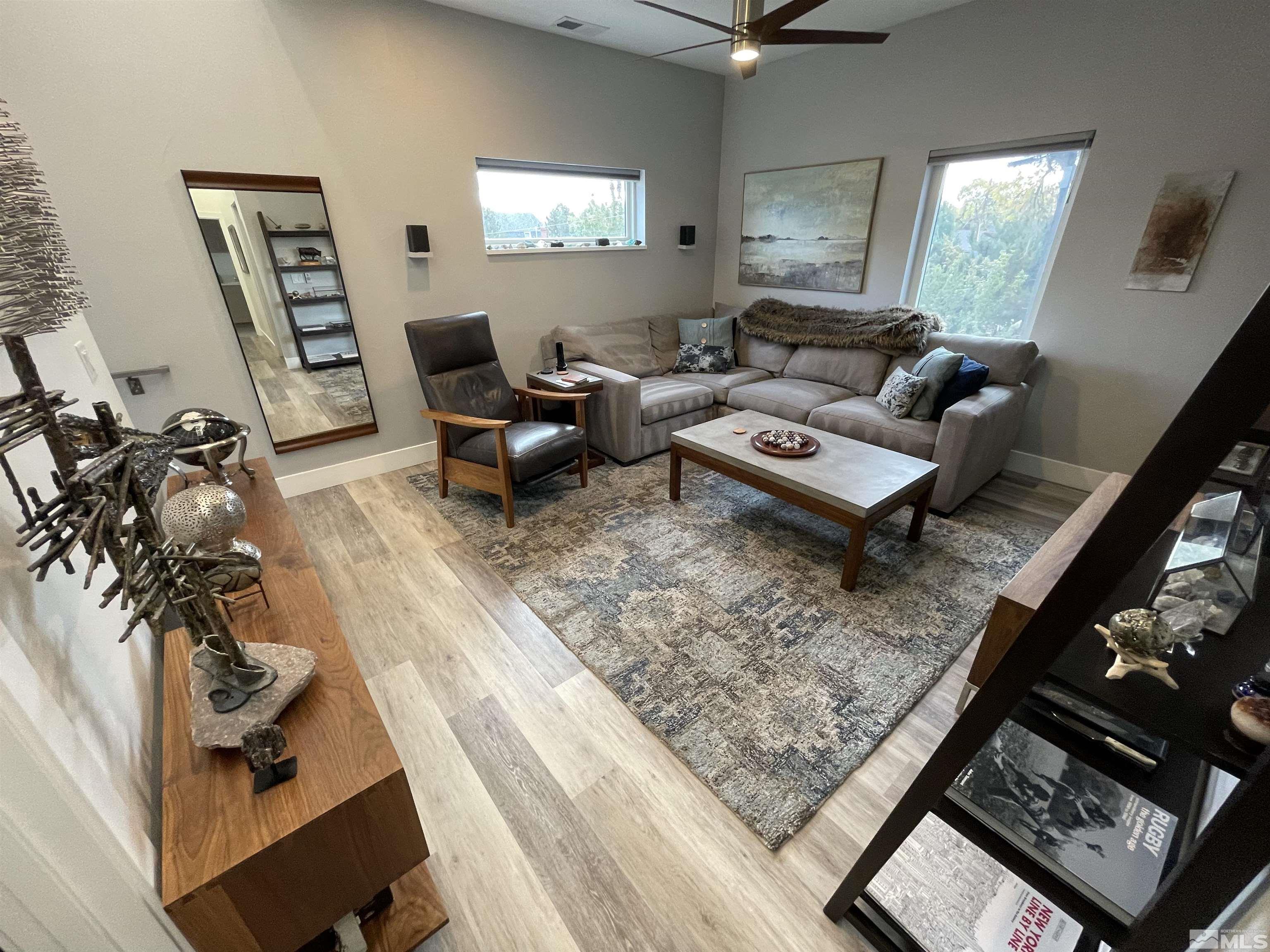 123 Martin Street Reno, NV 89509 - Photo 15 of 31 a living room with furniture and a wooden floor