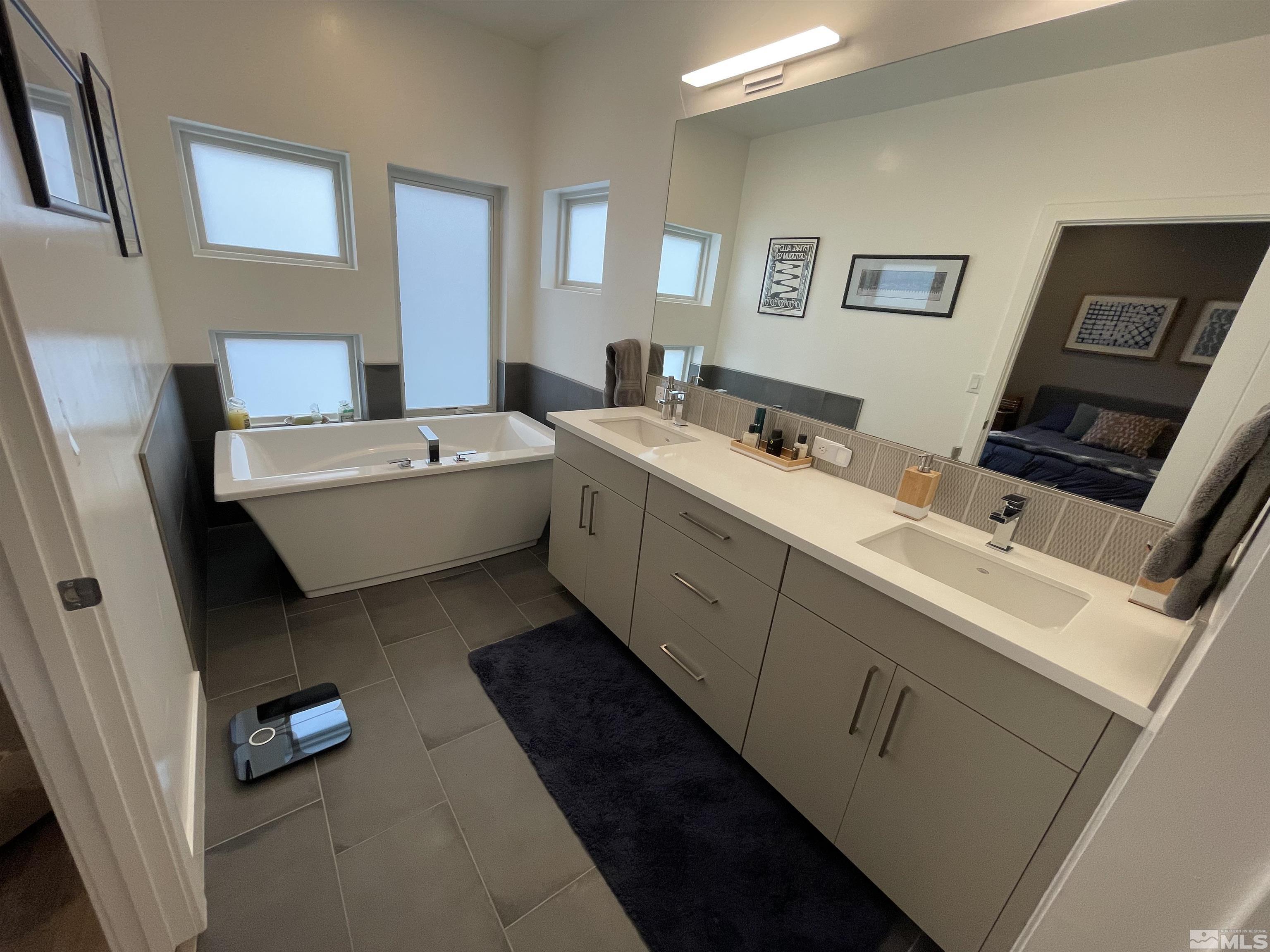 123 Martin Street Reno, NV 89509 - Photo 19 of 31 a room with a couch and a flat screen tv