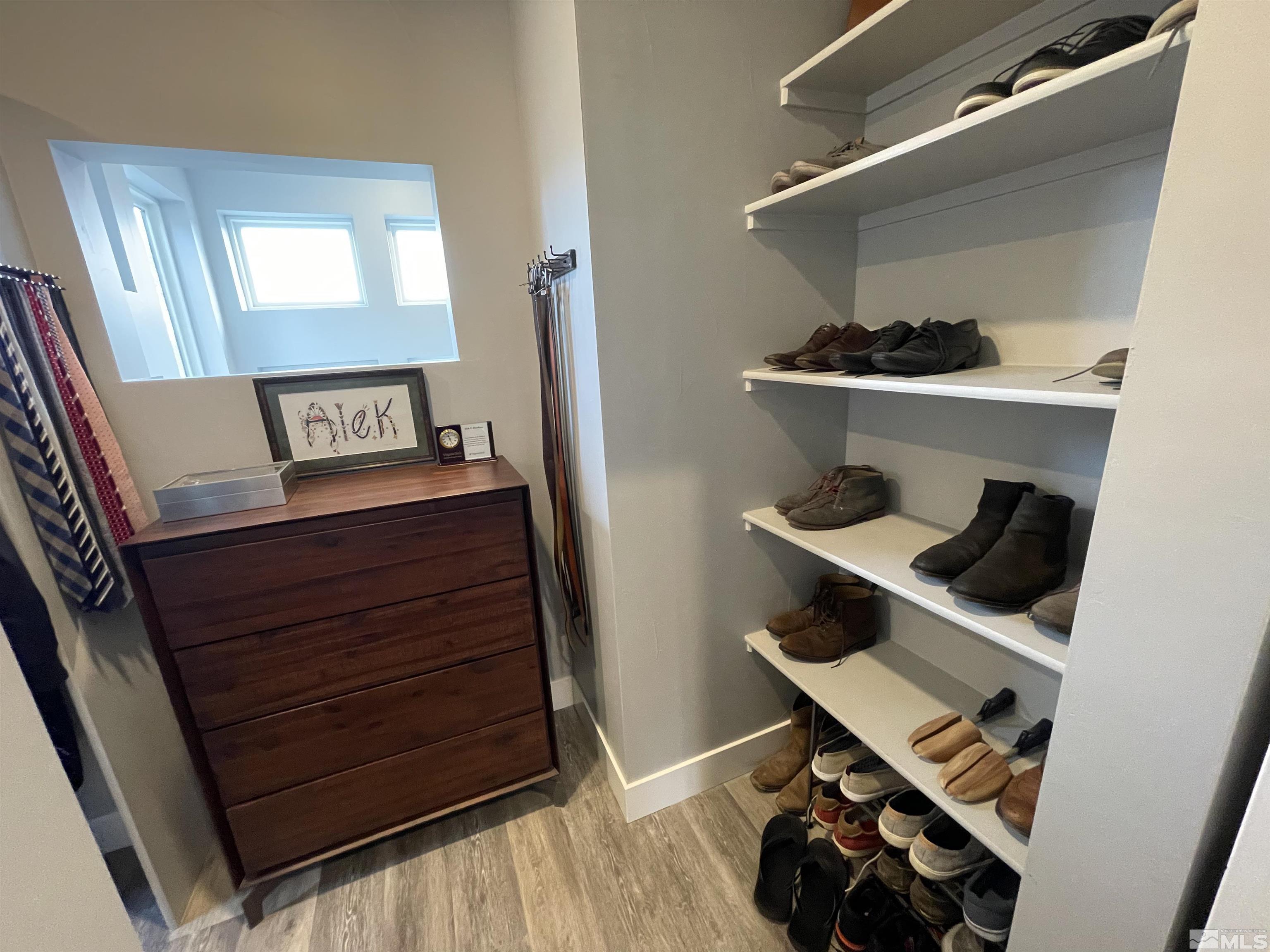 123 Martin Street Reno, NV 89509 - Photo 21 of 31 a view of hallway with stairs and wooden floor