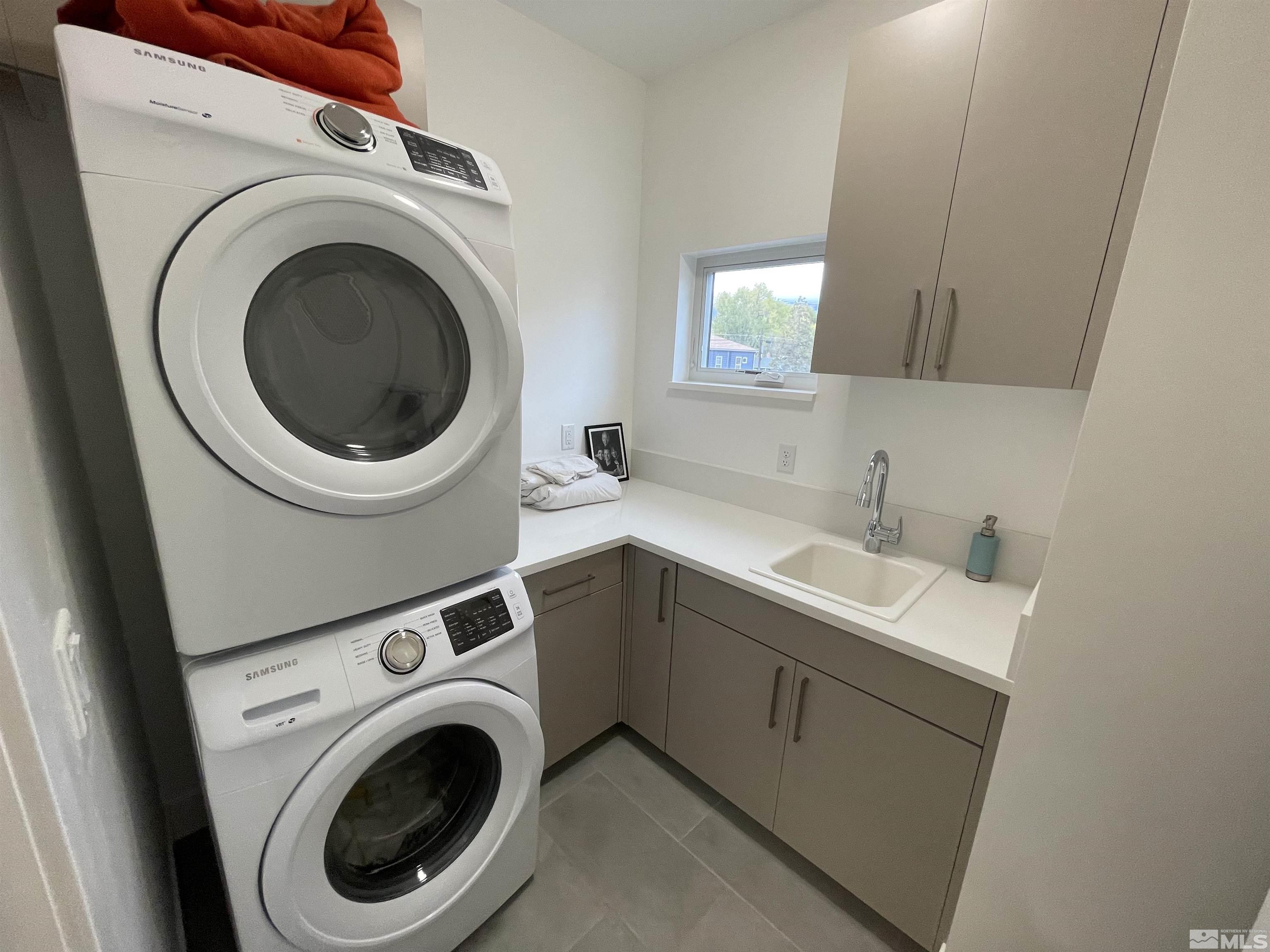123 Martin Street Reno, NV 89509 - Photo 24 of 31 a utility room with dryer and washer