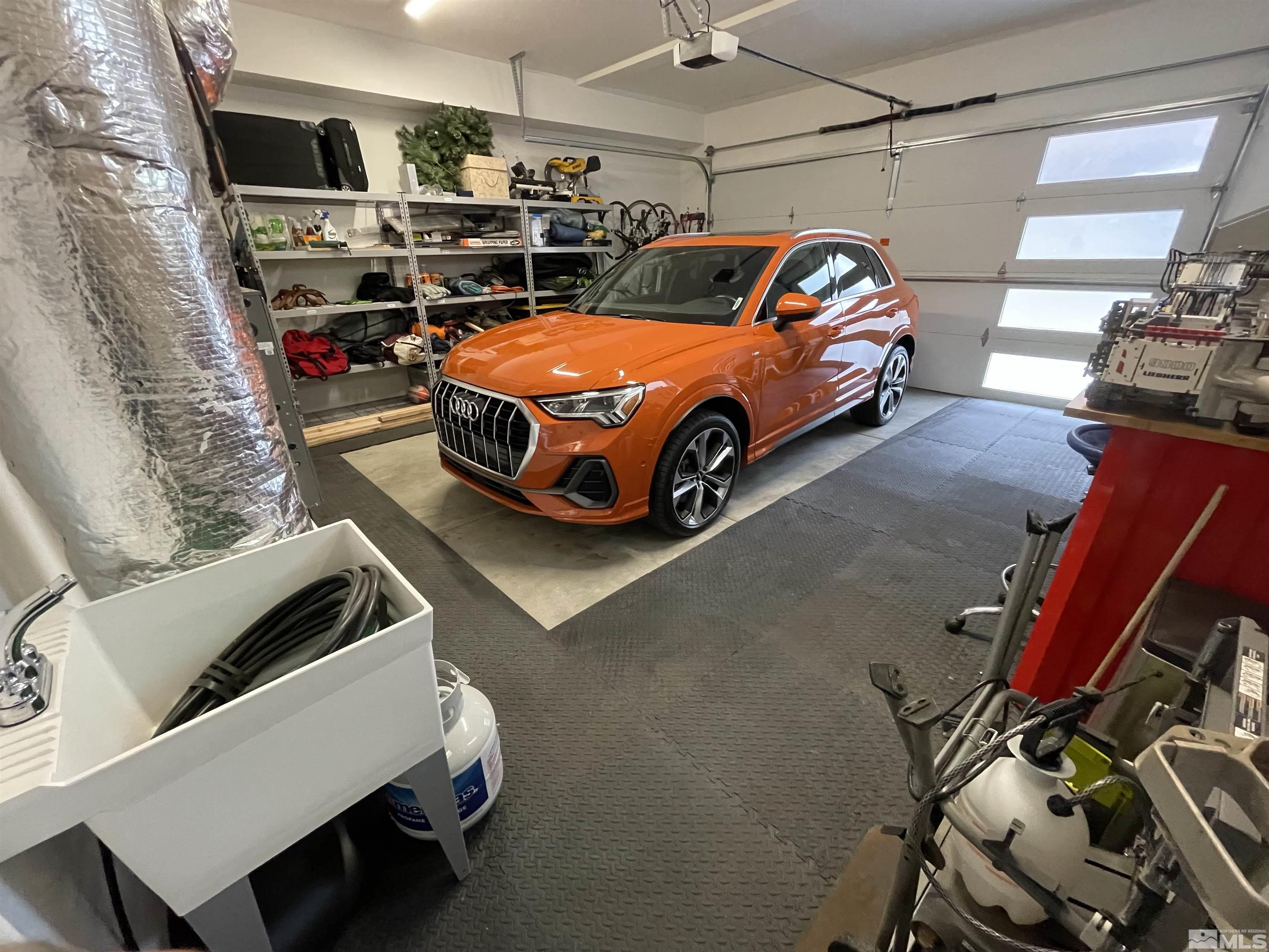 123 Martin Street Reno, NV 89509 - Photo 26 of 31 a car parked in a garage