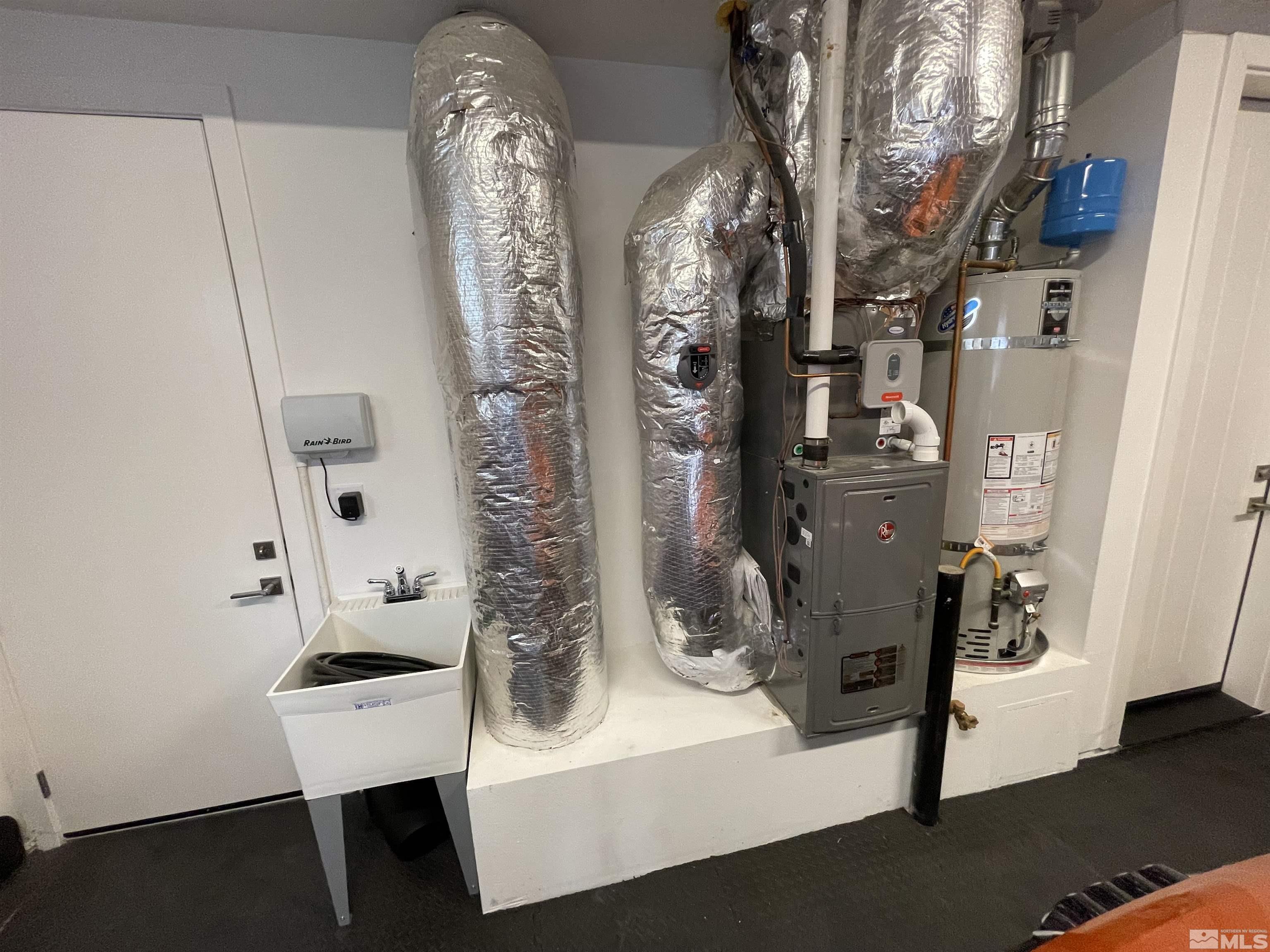 123 Martin Street Reno, NV 89509 - Photo 27 of 31 a view of water heater room