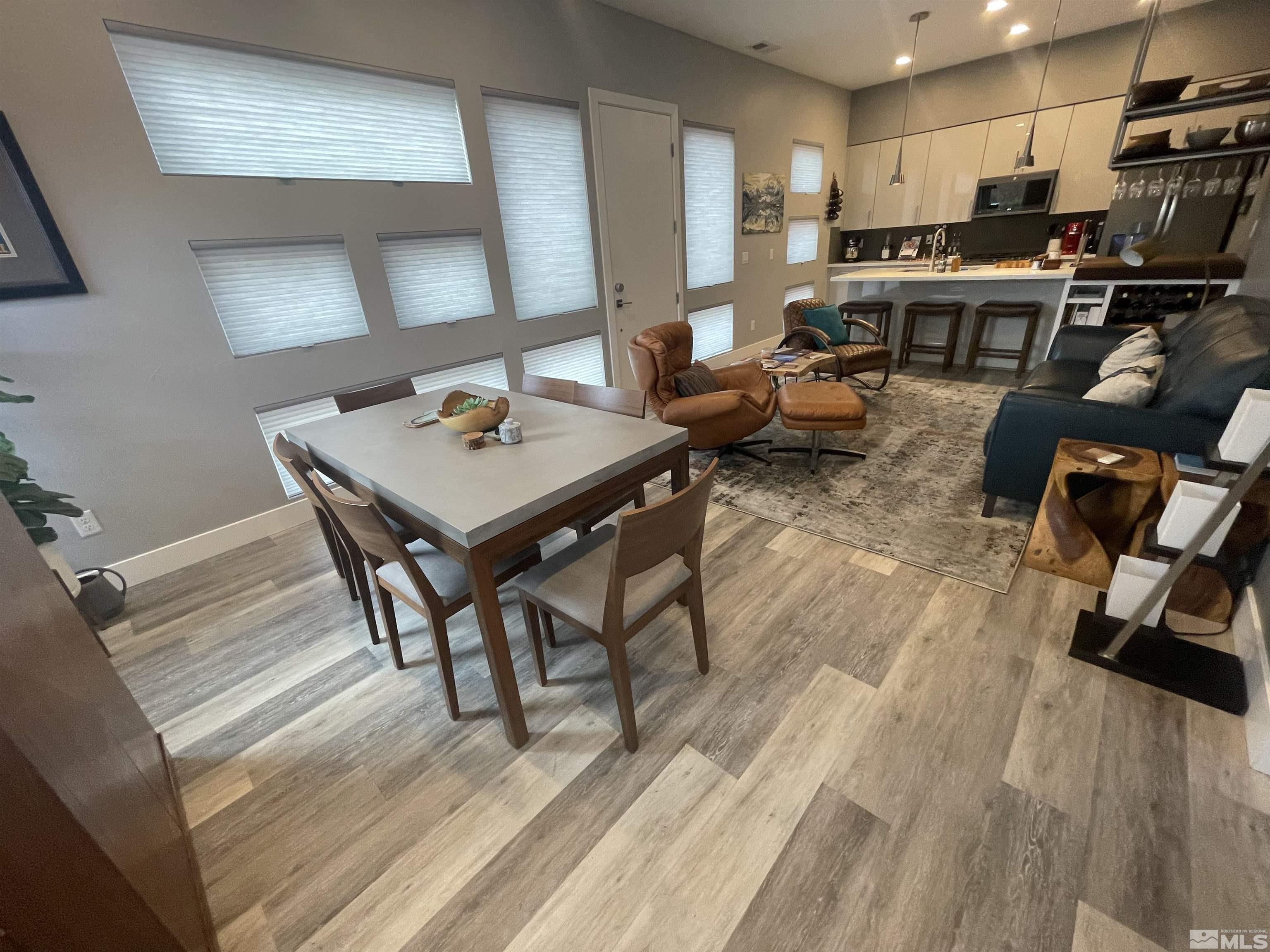 123 Martin Street Reno, NV 89509 - Photo 7 of 31 a living room with furniture and a flat screen tv