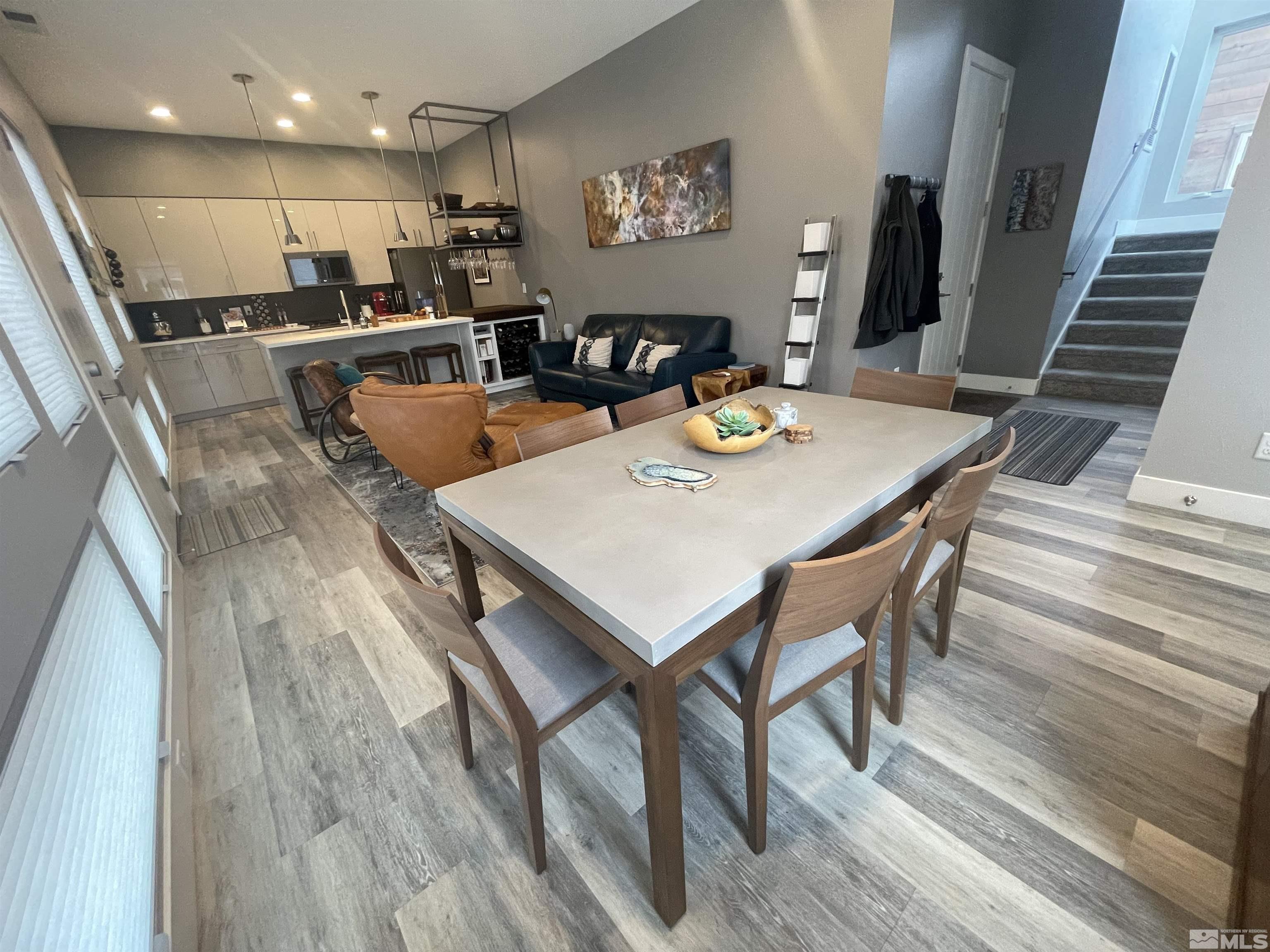 123 Martin Street Reno, NV 89509 - Photo 8 of 31 a view of a dining room with furniture and wooden floor