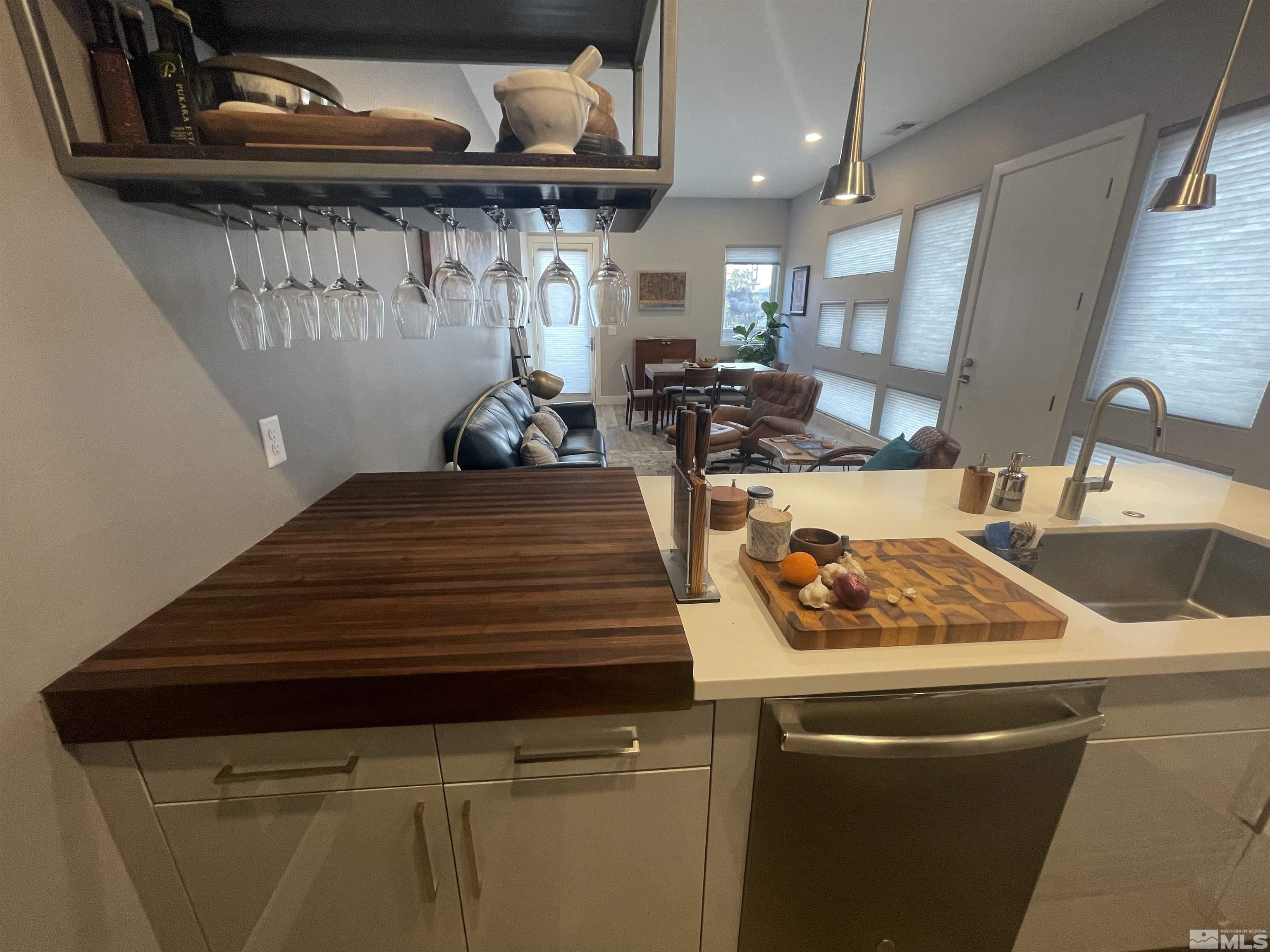 123 Martin Street Reno, NV 89509 - Photo 10 of 31 a view of a kitchen with a sink and dishwasher