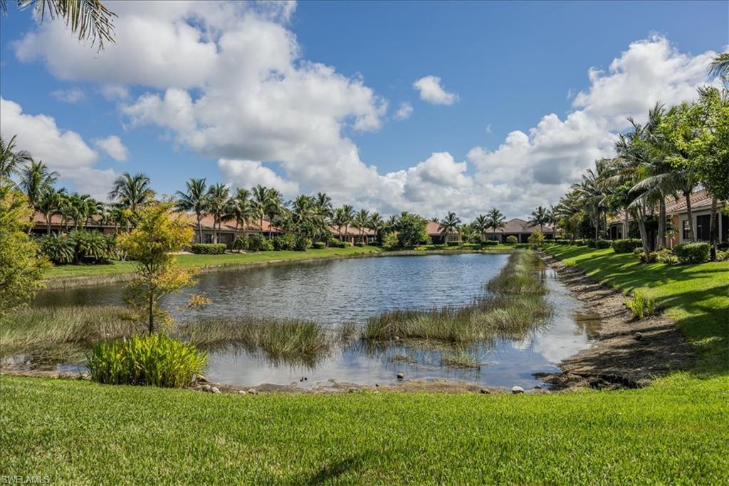 13466 Sumter Lane Naples, FL 34109 - Photo 23 of 36 Water view with nearby suburban area