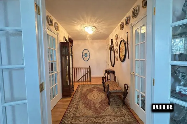 a view of a entryway with furniture and stairs