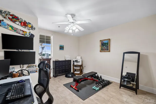 a view of a workspace with furniture and toys