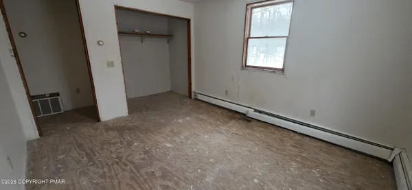 an empty room with windows
