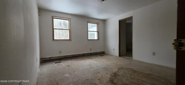 an empty room with windows