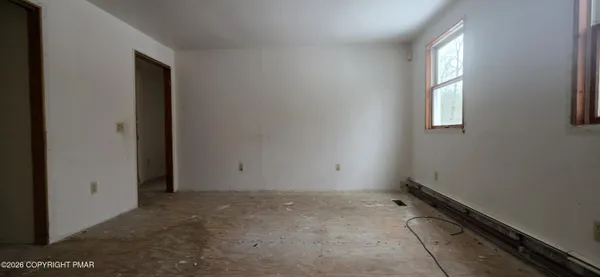 an empty room with windows