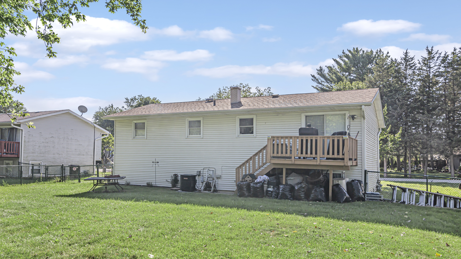 20677 Raphael Avenue Prairie View, IL 60089 - Photo 15 of 15 a view of a house with a backyard and a deck