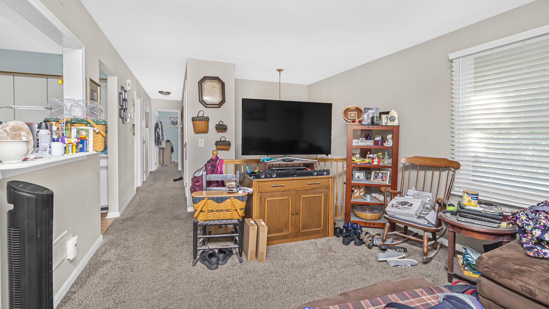 20677 Raphael Avenue Prairie View, IL 60089 - Photo 2 of 15 a room with furniture and a flat screen tv