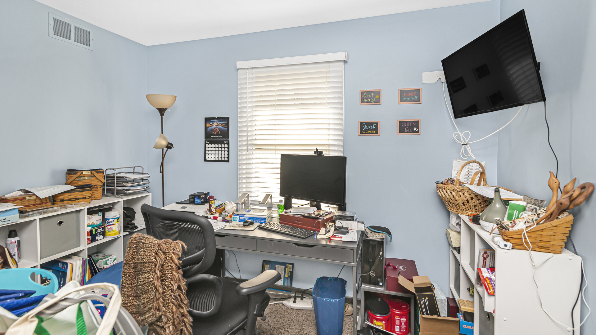 20677 Raphael Avenue Prairie View, IL 60089 - Photo 8 of 15 a work room with furniture a flat screen tv and a window