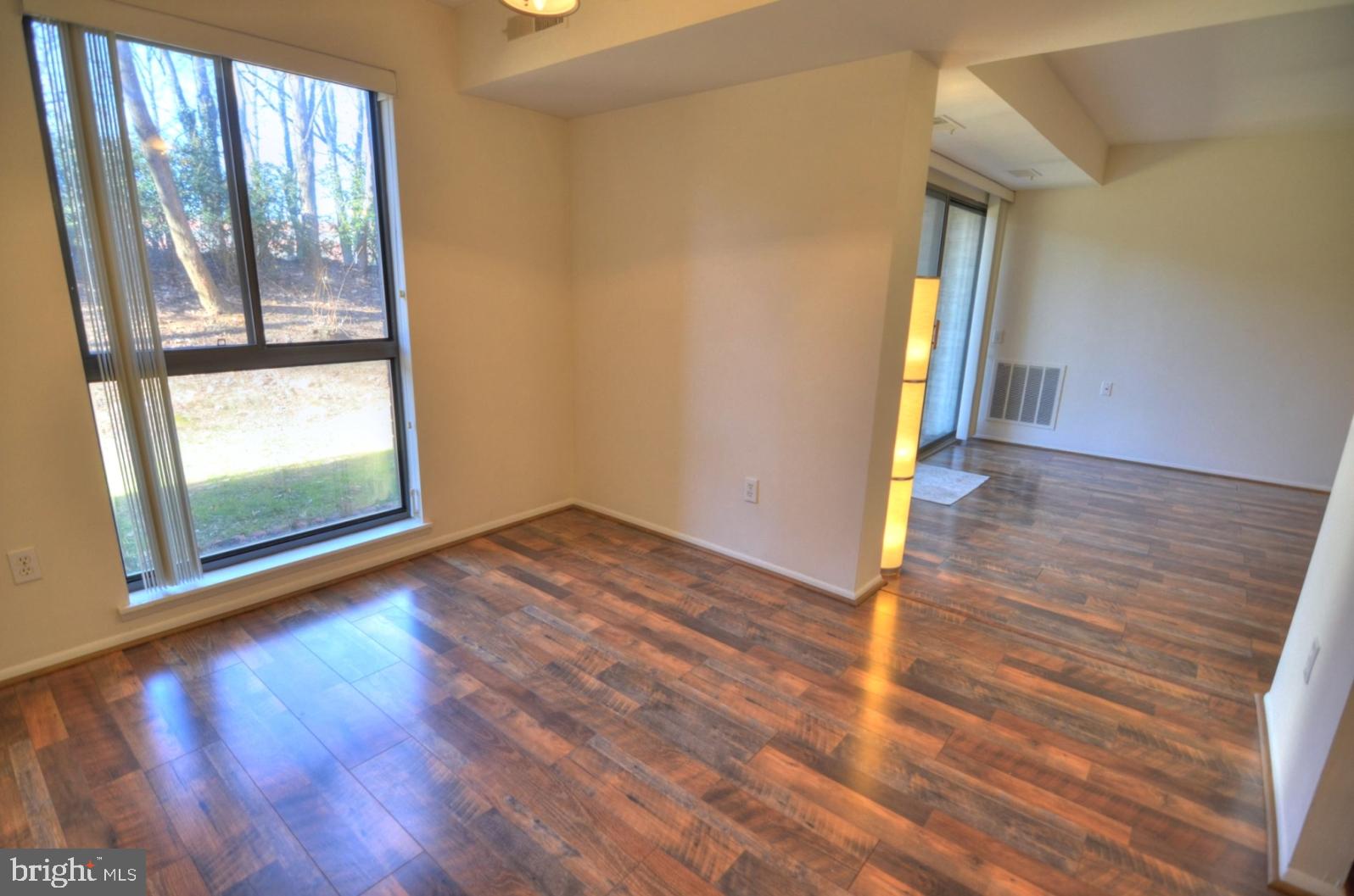 2072 Royal Fern Court, Unit 1B Reston, VA 20191 - Photo 13 of 37 View of living room from dining room