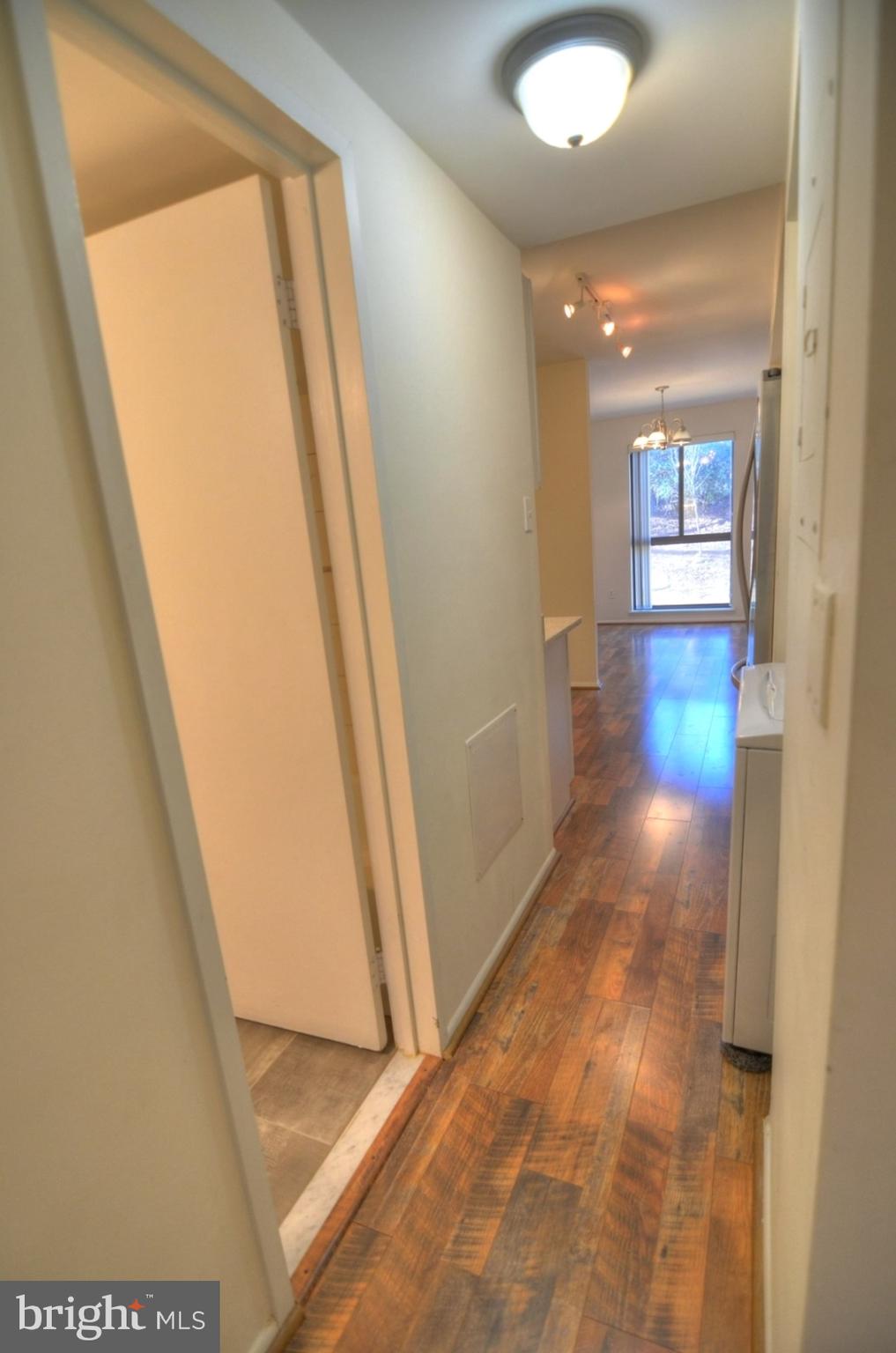 2072 Royal Fern Court, Unit 1B Reston, VA 20191 - Photo 19 of 37 Dining room view from hallway
