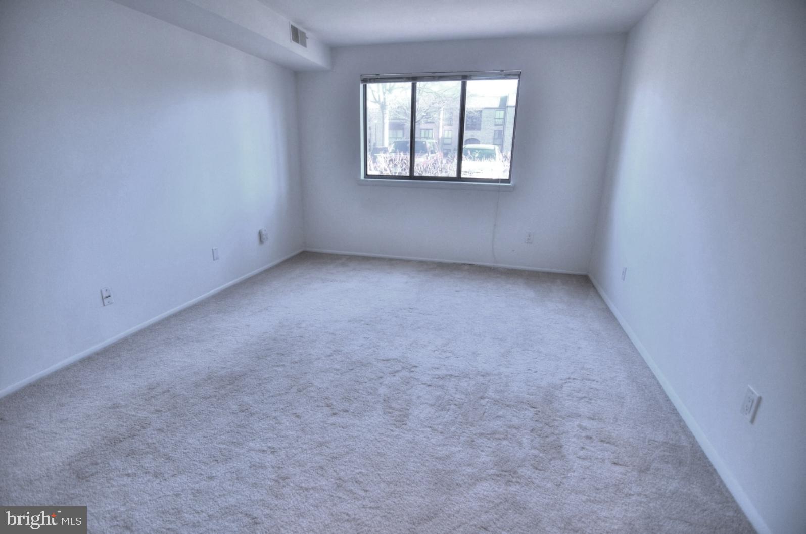 2072 Royal Fern Court, Unit 1B Reston, VA 20191 - Photo 23 of 37 Bedroom 1- Very light and bright