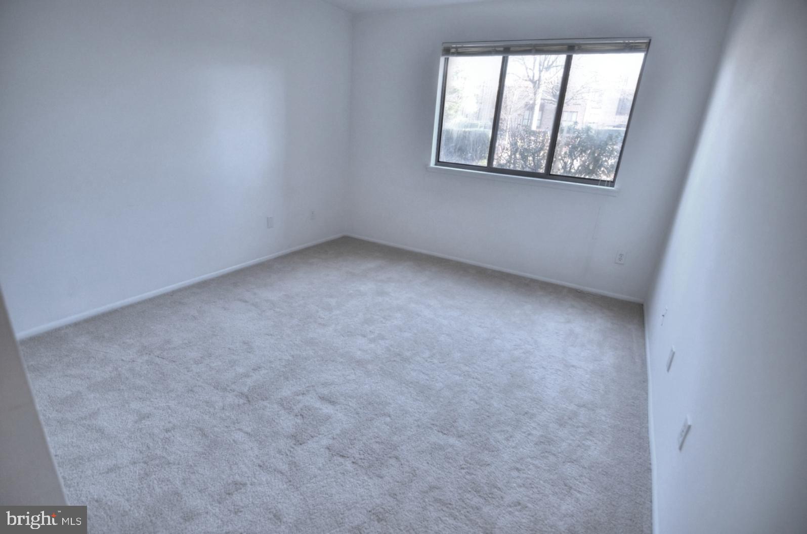 2072 Royal Fern Court, Unit 1B Reston, VA 20191 - Photo 27 of 37 Bedroom 2 - Very light and bright