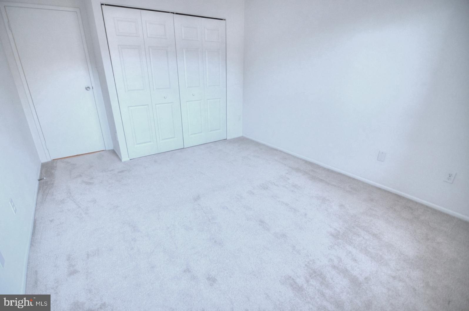 2072 Royal Fern Court, Unit 1B Reston, VA 20191 - Photo 28 of 37 Bedroom 2 - Great closet space