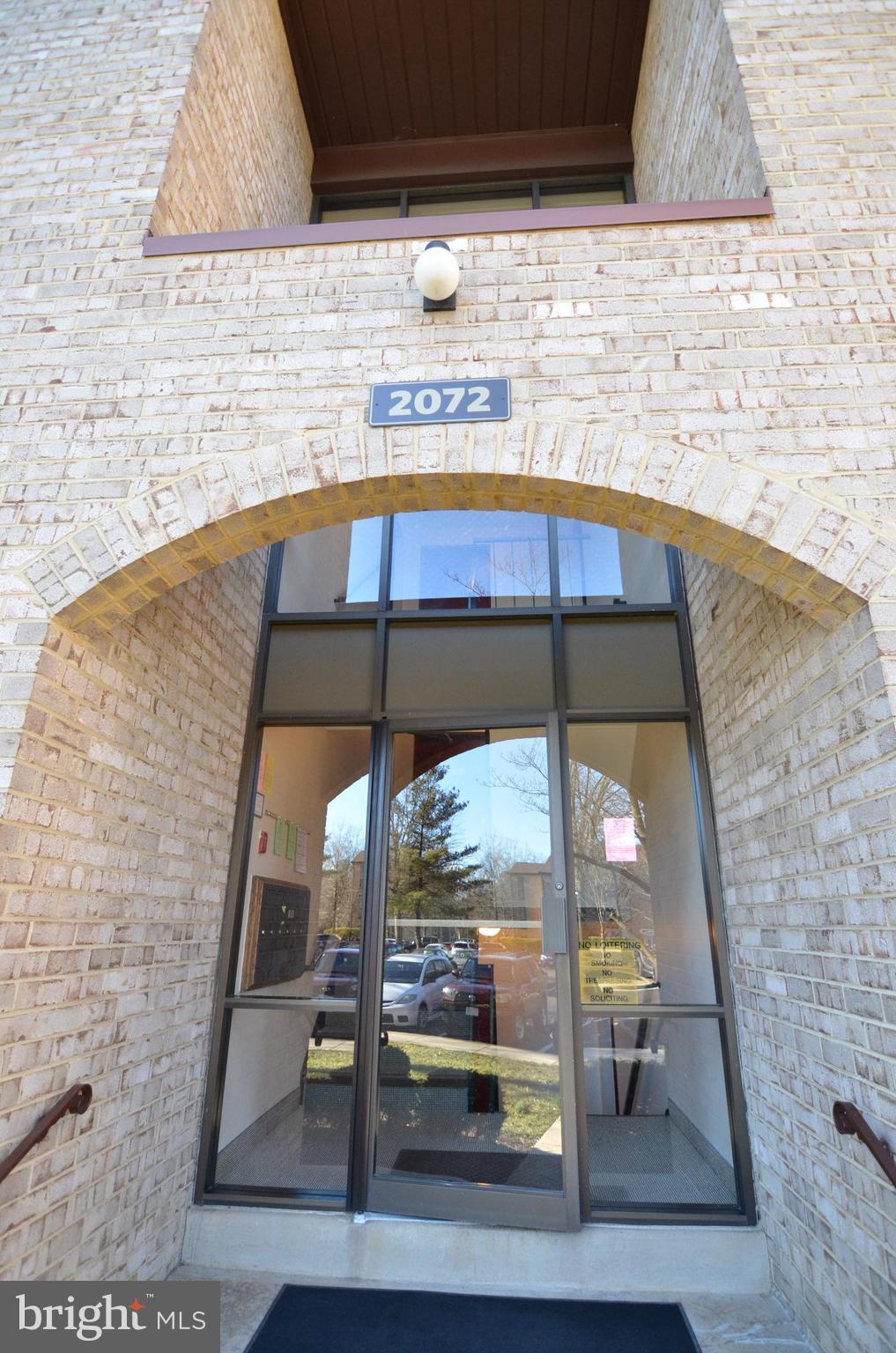 2072 Royal Fern Court, Unit 1B Reston, VA 20191 - Photo 34 of 37 Enclosed entrance to Building 2072