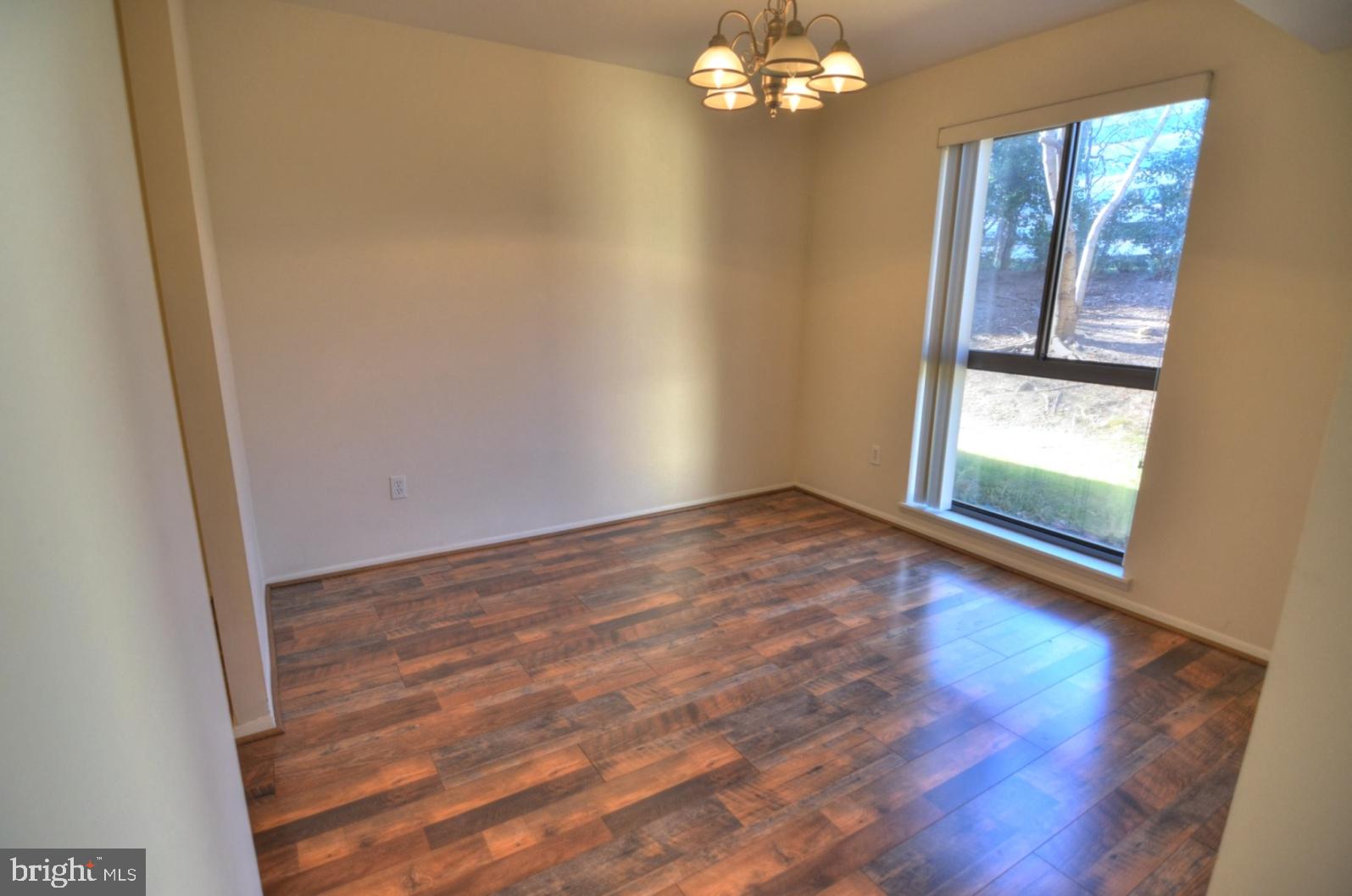 2072 Royal Fern Court, Unit 1B Reston, VA 20191 - Photo 10 of 37 Dining room with private outdoor views