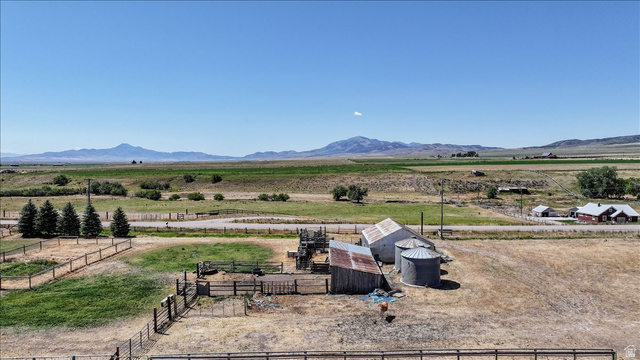 1634 West Arimo Road Arimo, ID 83214 - Photo 76 of 89 Expansive rural property featuring multiple outbuildings, agricultural silos, and fenced enclosures