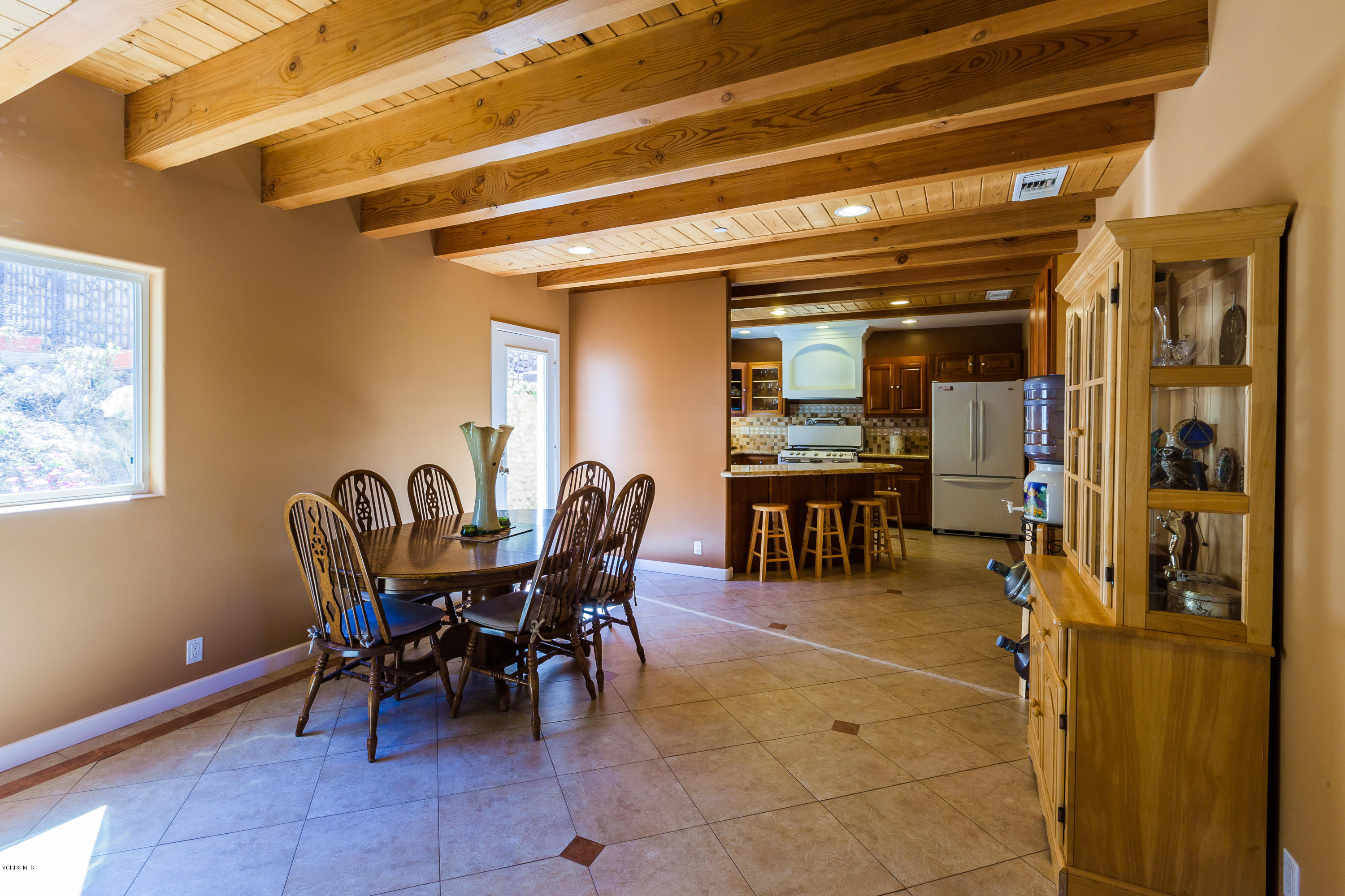 6304 Alta Vista Road Simi Valley, CA 93063 - Photo 1 of 20 a view of a dining room with furniture and a chandelier