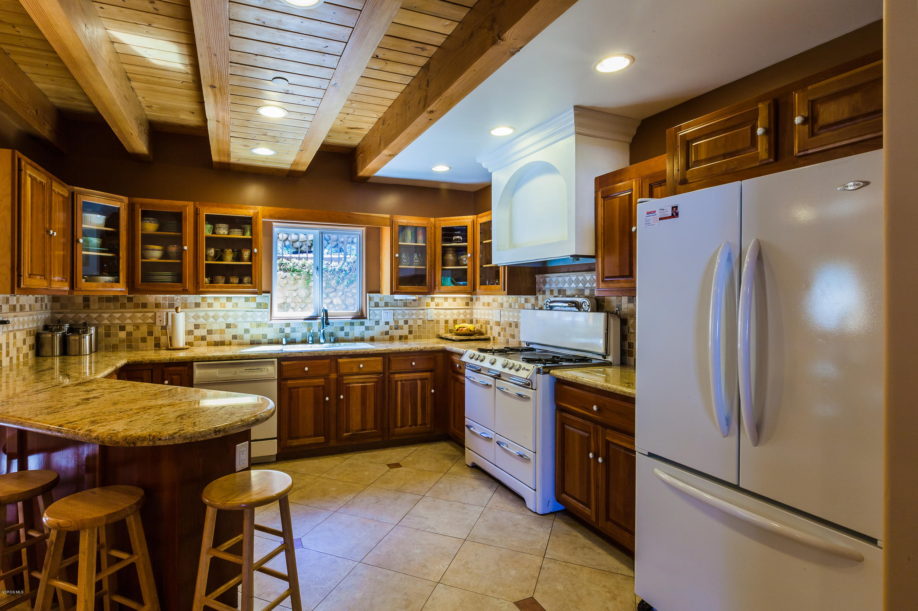 6304 Alta Vista Road Simi Valley, CA 93063 - Photo 2 of 20 a kitchen with granite countertop stainless steel appliances a sink and counter