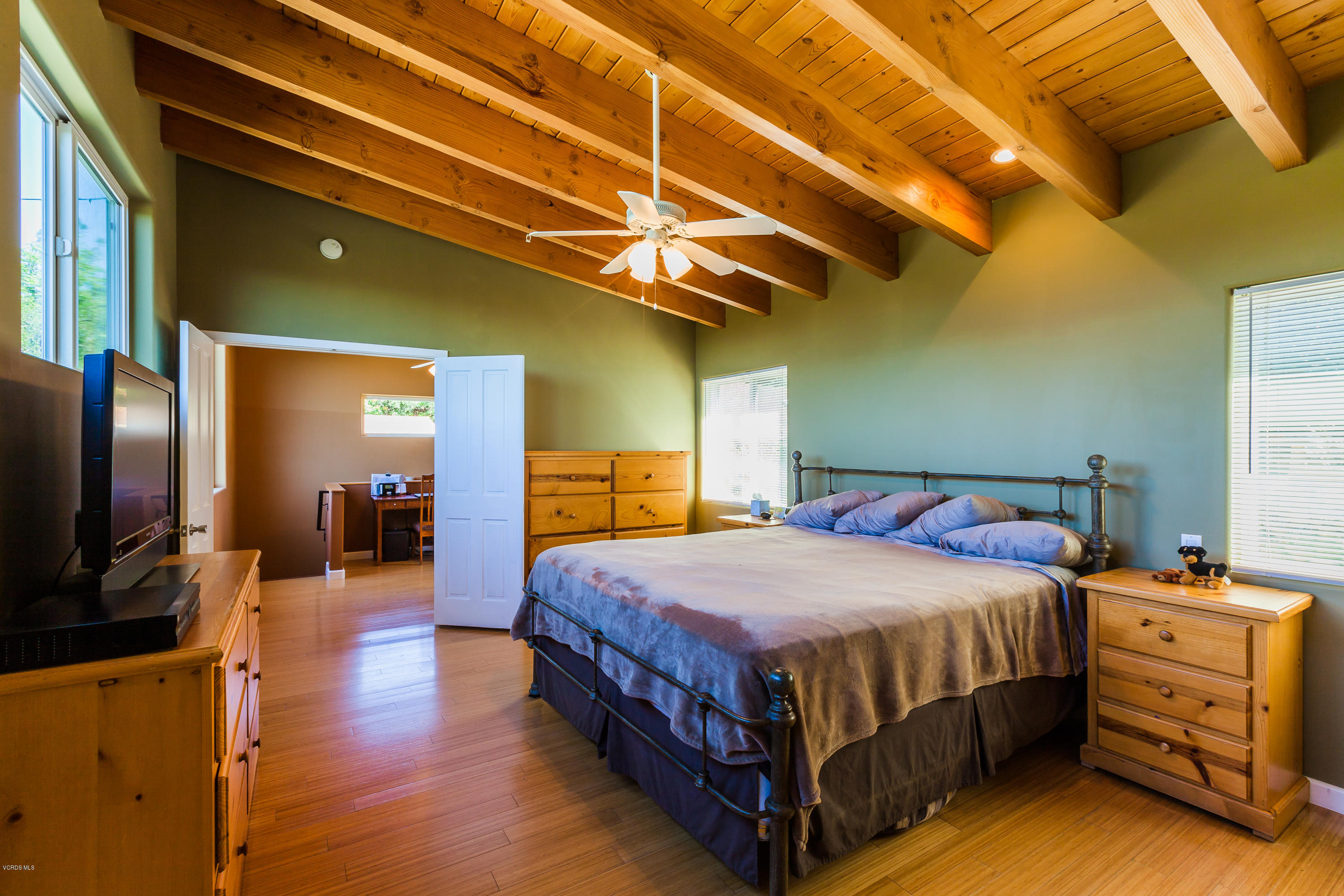6304 Alta Vista Road Simi Valley, CA 93063 - Photo 14 of 20 a bedroom with a bed and wooden floor