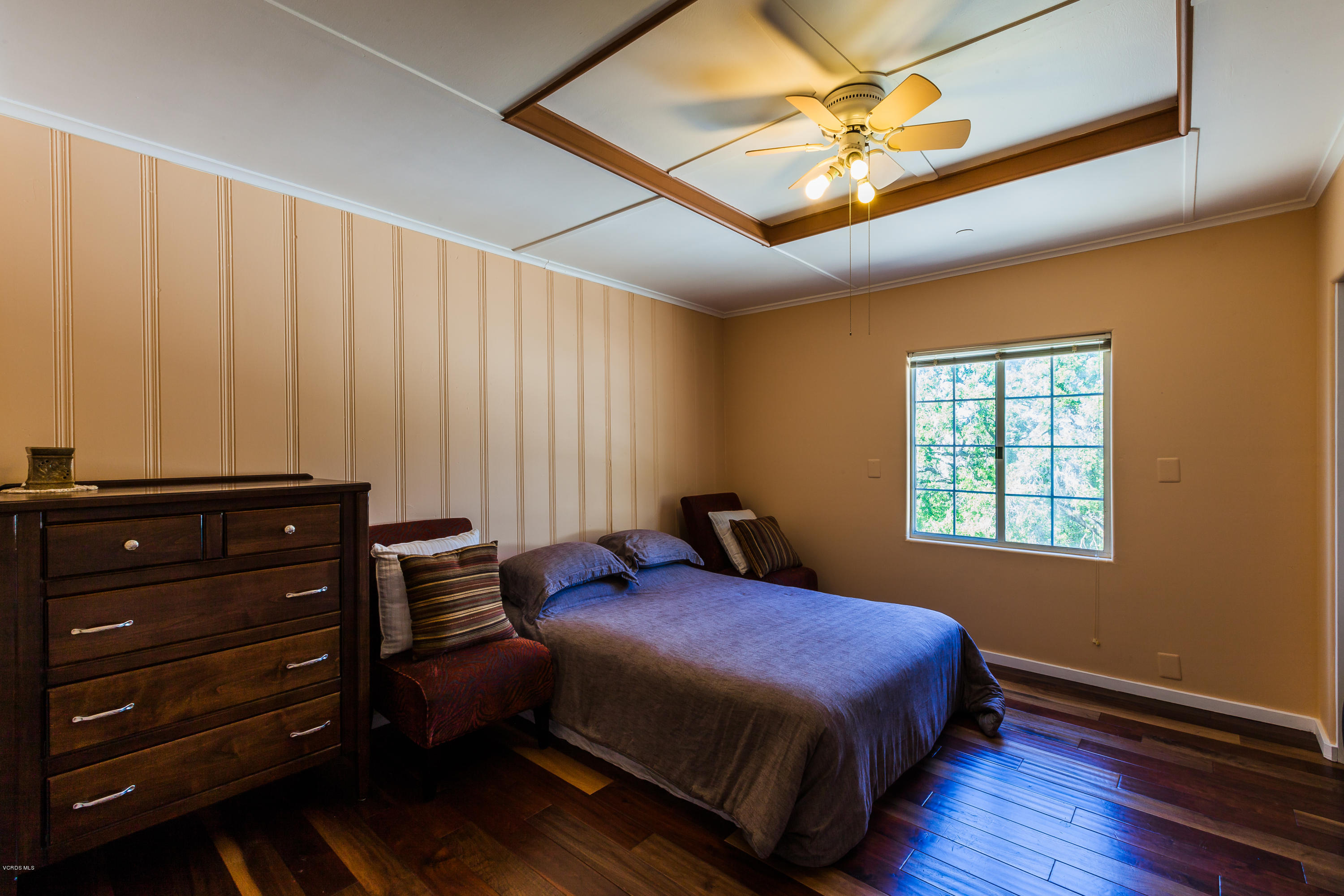 6304 Alta Vista Road Simi Valley, CA 93063 - Photo 7 of 20 a bedroom with a bed and a window
