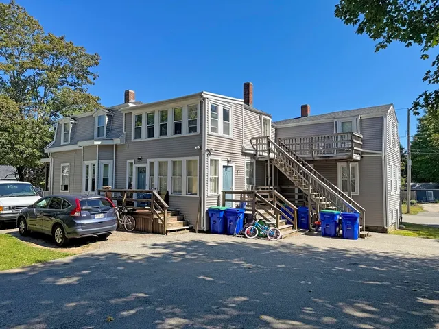 a car parked in front of a house