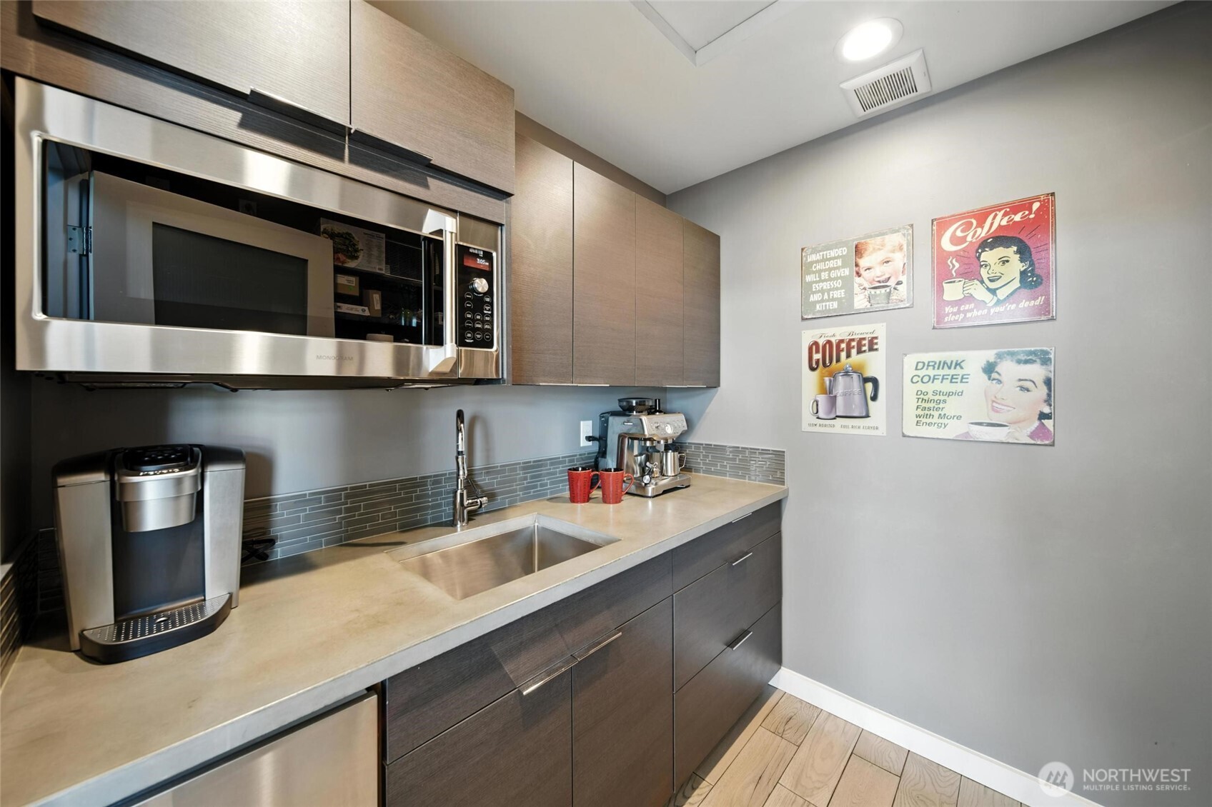 2150 Paramount Street Walla Walla, WA 99362 - Photo 14 of 40 a kitchen with stainless steel appliances a microwave and sink