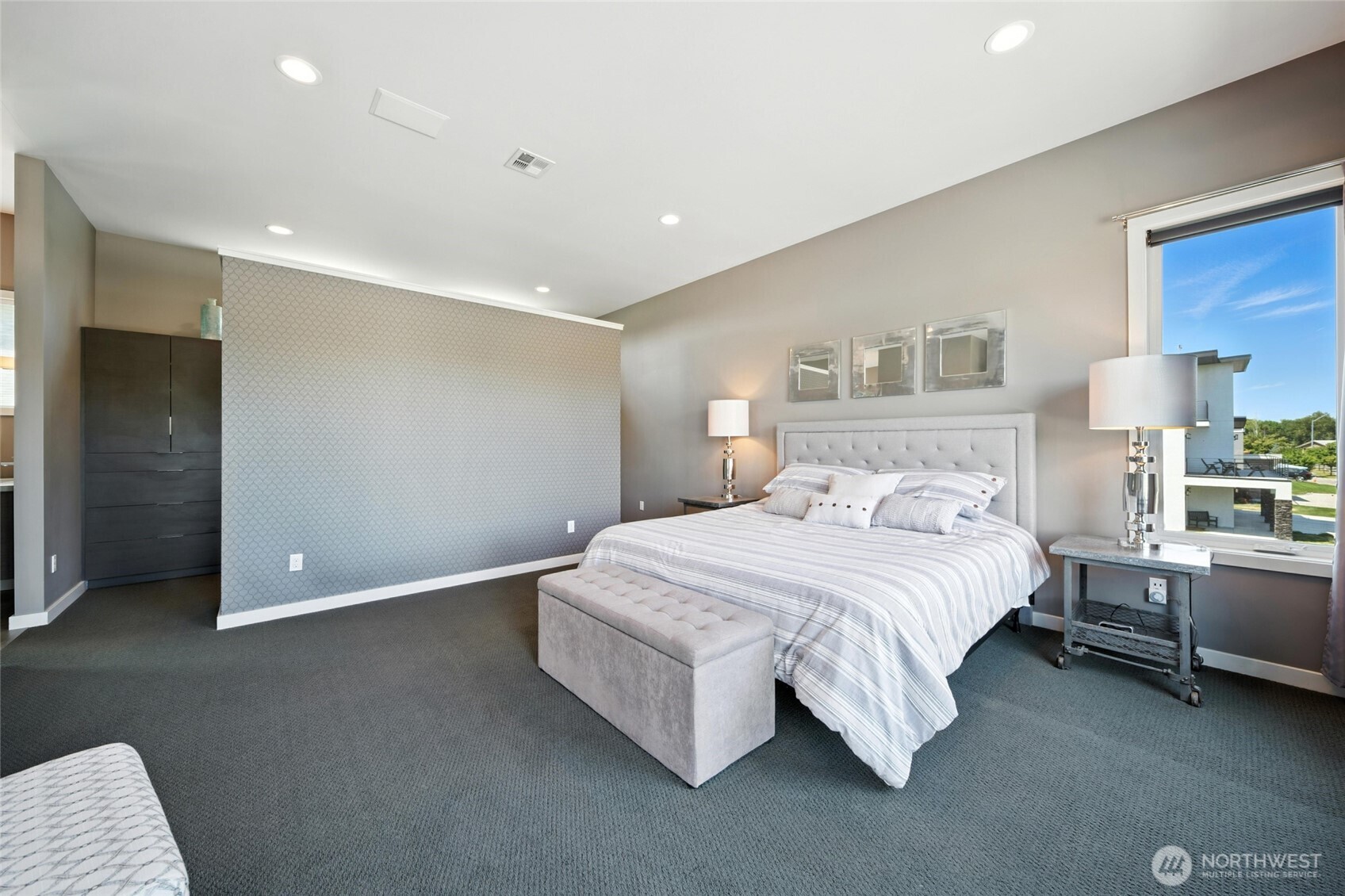 2150 Paramount Street Walla Walla, WA 99362 - Photo 16 of 40 a spacious bedroom with a bed and furniture
