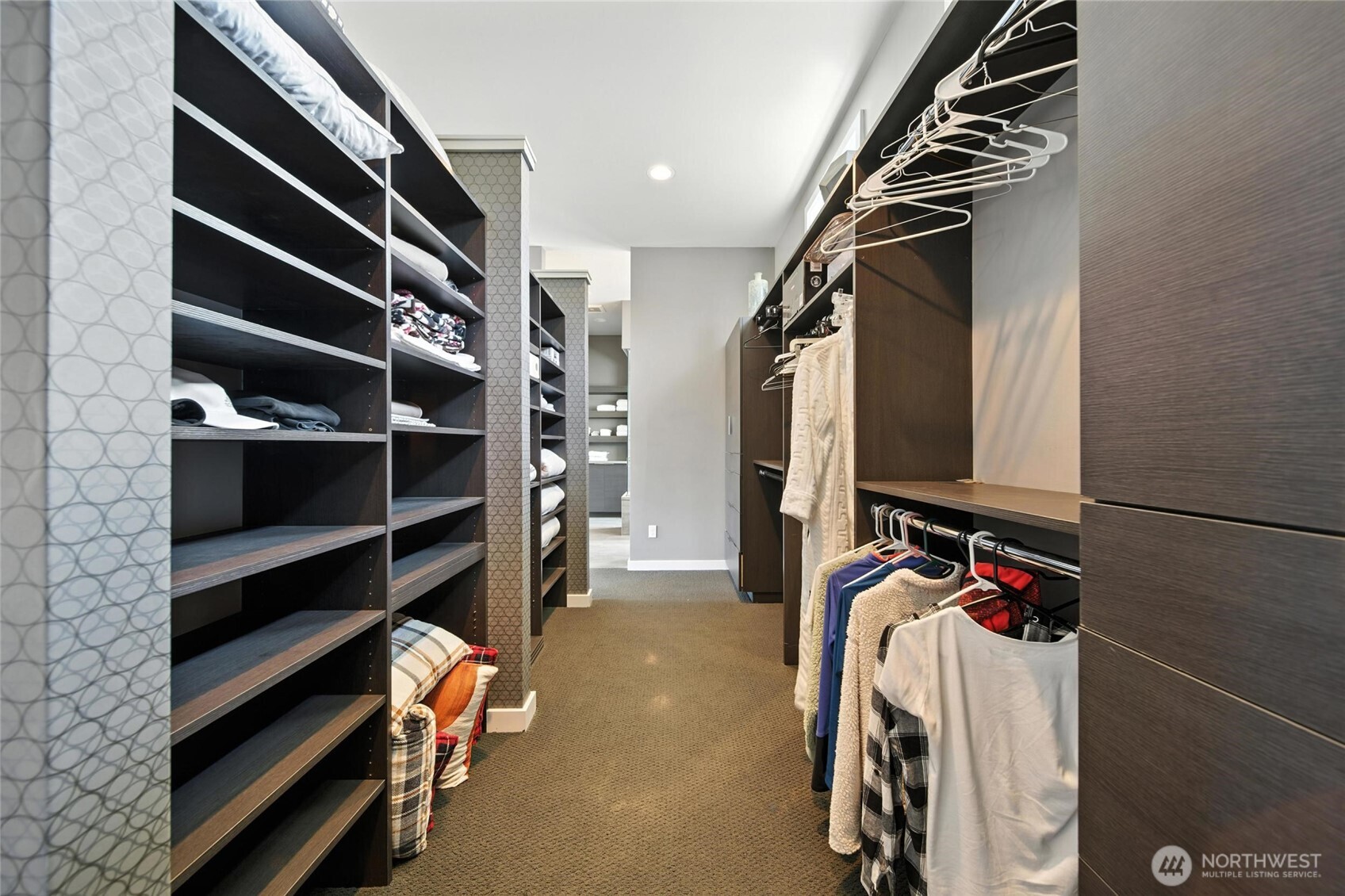 2150 Paramount Street Walla Walla, WA 99362 - Photo 20 of 40 a view of walk in closet with clothes and shoes