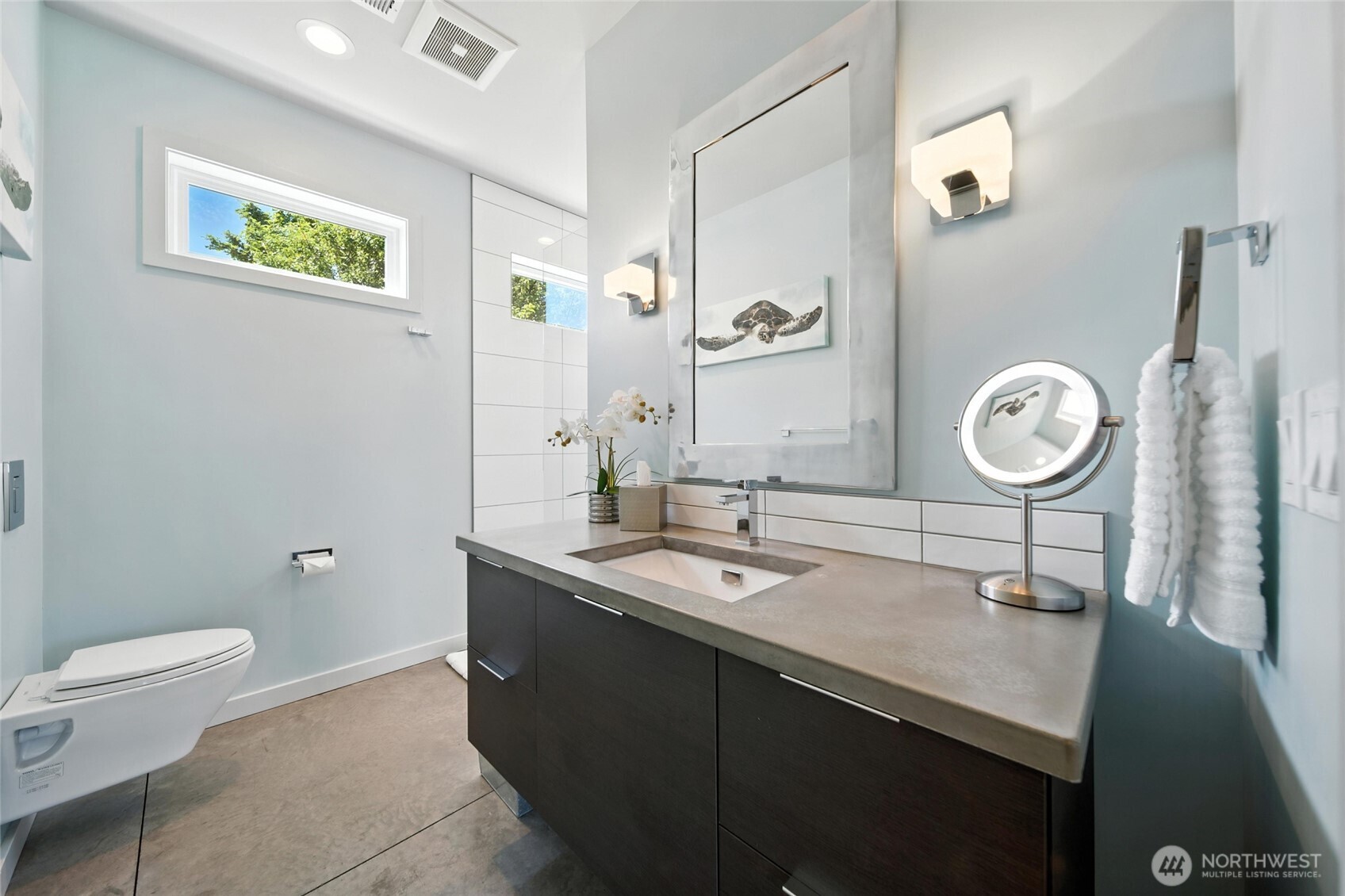 2150 Paramount Street Walla Walla, WA 99362 - Photo 28 of 40 a bathroom with a sink a toilet and a mirror