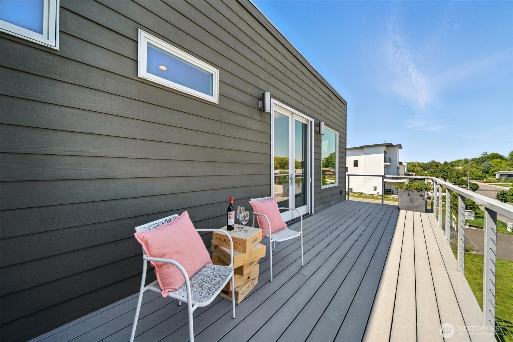 2150 Paramount Street Walla Walla, WA 99362 - Photo 32 of 40 a view of a roof deck with table and chairs and wooden floor