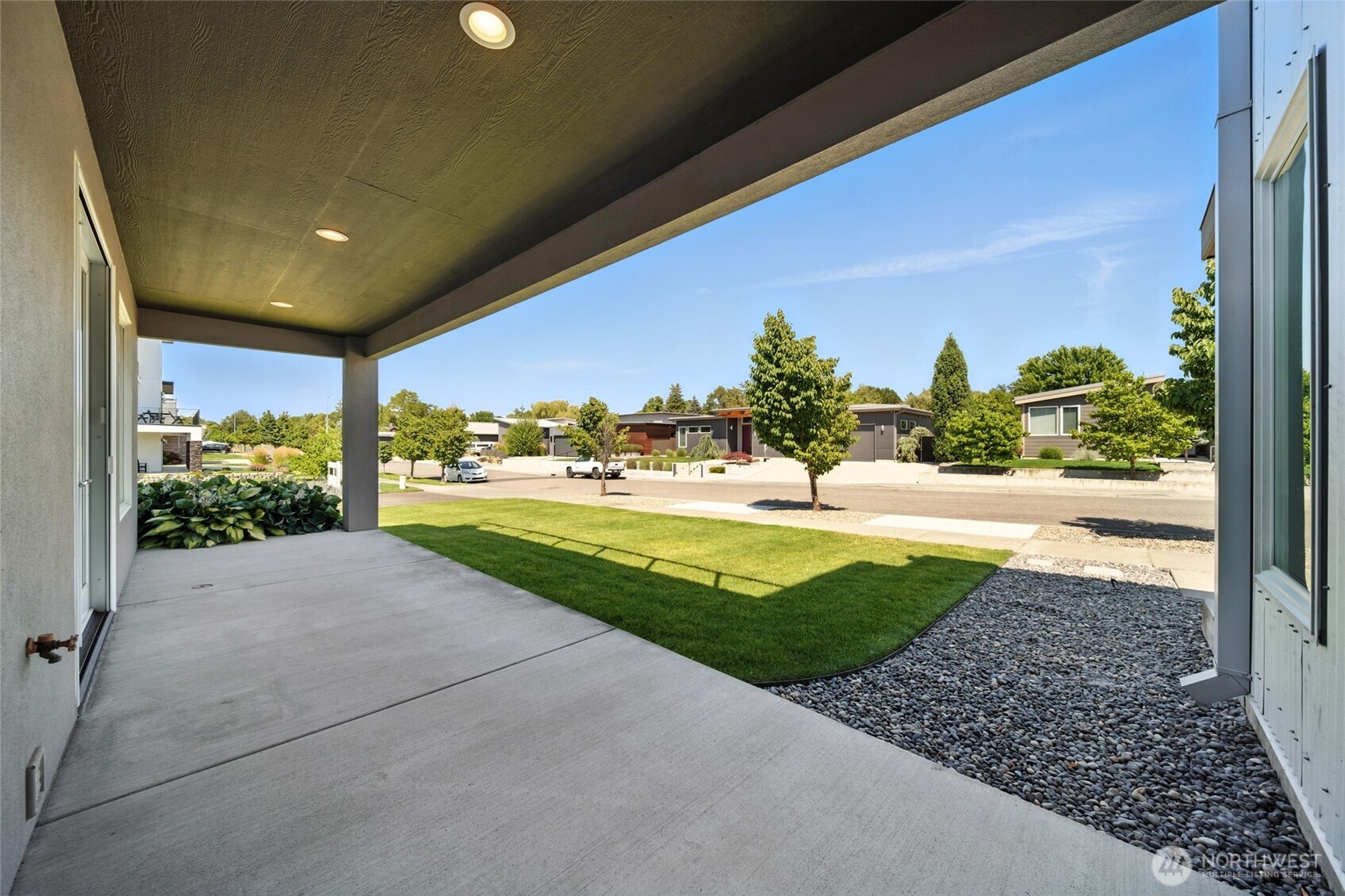 2150 Paramount Street Walla Walla, WA 99362 - Photo 36 of 40 a view of a house with a yard and potted plants
