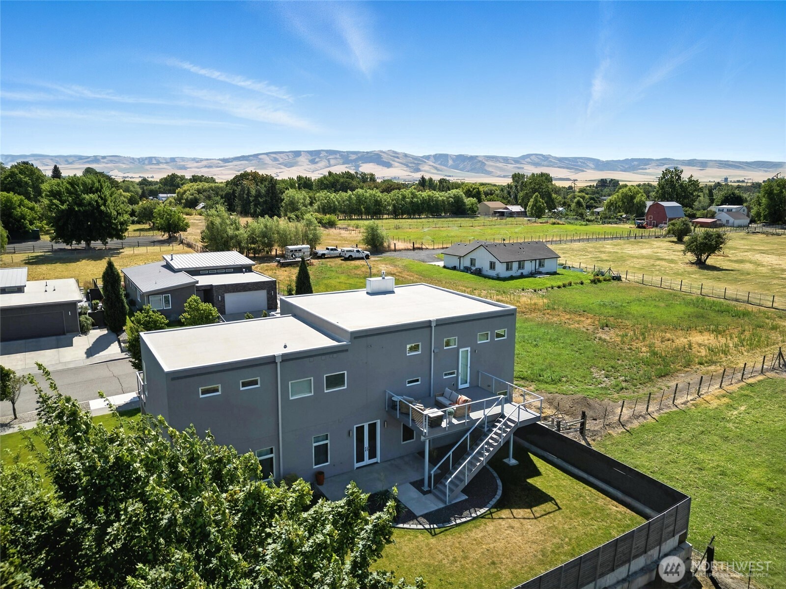 2150 Paramount Street Walla Walla, WA 99362 - Photo 39 of 40 an aerial view of a house with a garden and lake view