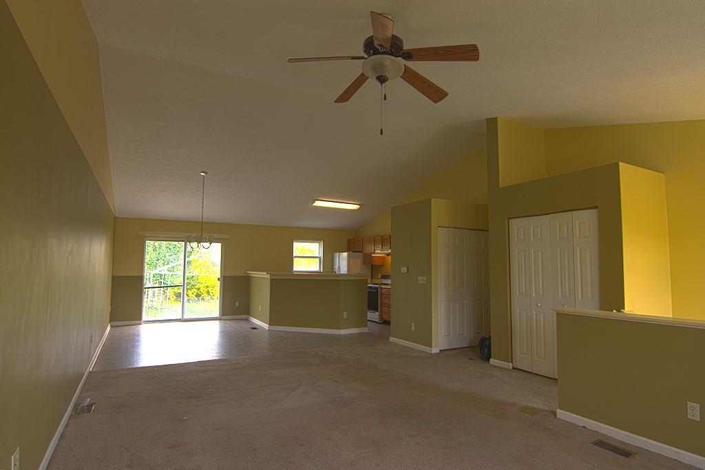 57 Peters Road Greensburg, PA 15601 - Photo 3 of 19 Wonderful Open Floor Plan showing Livingroom, Diningroom, and Kitchen with Bar and 12' Ceilings.