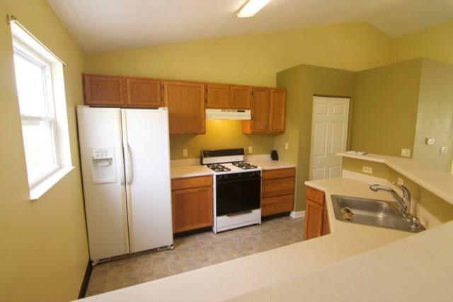 57 Peters Road Greensburg, PA 15601 - Photo 5 of 19 Light and Bright Kitchen Open to Livingroom and Diningroom. Great Food Pantry.
