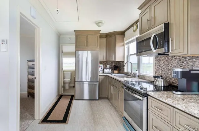 $699,000 | 14 Huntington Drive, Mastic Beach, NY 11951