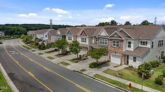 a view of a house with a garden and plants