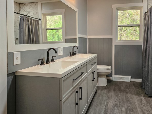 265 Tyler Road Ellijay, GA 30540 - Photo 12 of 43 a bathroom with a sink toilet and window