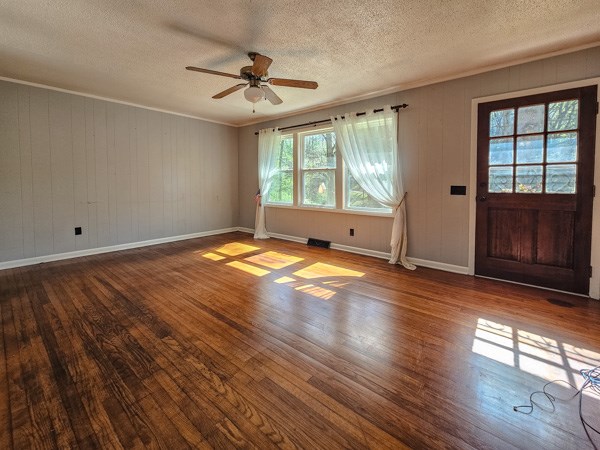265 Tyler Road Ellijay, GA 30540 - Photo 17 of 43 a view of an empty room with wooden floor and a window